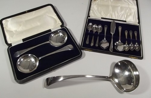 FLATWARE
An EPNS soup ladle & two cased sets.