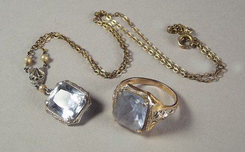 COSTUME JEWELLERY
A 1940's pendant necklace & a similarly set ring on 10k shank.