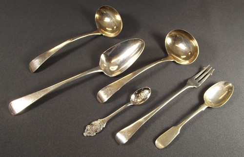 SILVER FLATWARE
A pair of Georgian sauce ladles by B & W Bateman & other flatware.