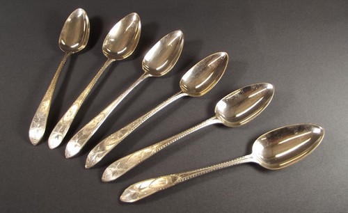 IRISH SILVER SPOONS
A good set of five bright cut Irish silver tablespoons, Dublin 1827 & one