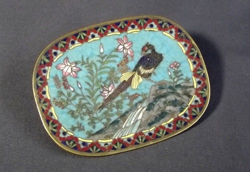 CHINESE CLOISONNE
A shallow Chinese cloisonne dish, decorated a bird on a rocky outcrop. Width 5