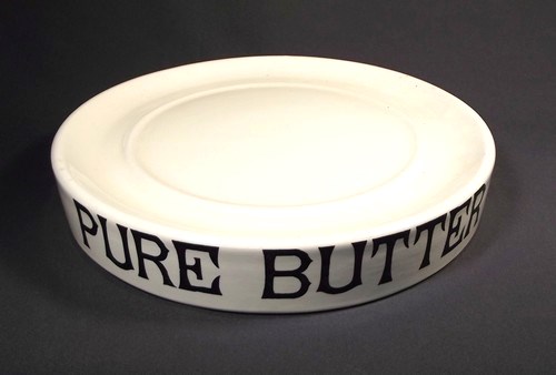 VICTORIAN BUTTER STAND
A Victorian 'Pure Butter' ceramic stand, the underside with printed back