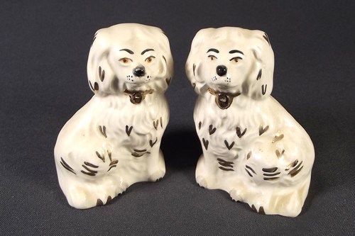 ROYAL DOULTON
A pair of Royal Doulton small Staffordshire dogs. Height 3 1/2 ins.