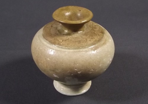 CAMBODIAN POTTERY
A Cambodian Angkor period stoneware pot decorated with light green glaze to body &