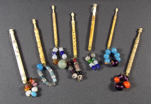 NAMED LACE BOBBINS
A collection of seven turned bone lace bobbins, each decorated with a name,