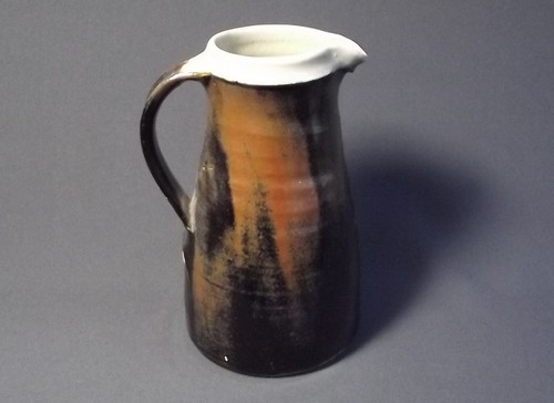 LEACH POTTERY
A Leach Pottery Standard Ware tall 3 pint jug. Height 9 1/2 ins. Pottery mark.