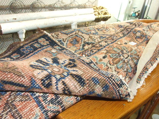 BLUE AND RED PATTERNED RUG