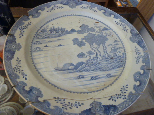 TWO EARLY CHINESE BLUE AND WHITE CHARGES- DAMAGED 55CMS DIAMETER