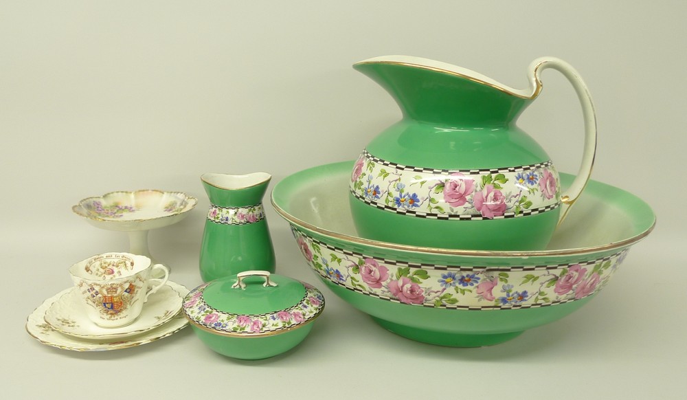 An Aynsley jug and bowl set with soap dish and toothbrush holder, a Diamond Jubilee trio 1897, and a