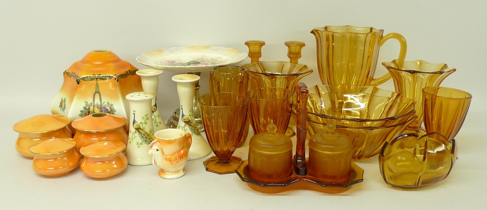 A quantity of 1930's pressed amber glass including two cake stands, two large bowls, 22cm