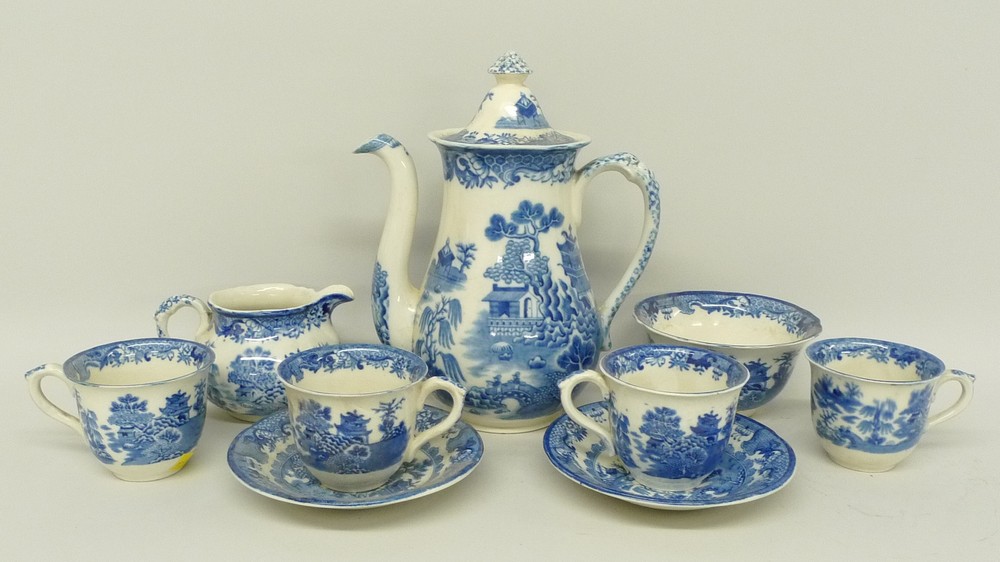 A Royal Worcester pottery part coffee service decorated in the 'Crown Willow' pattern, printed mark,