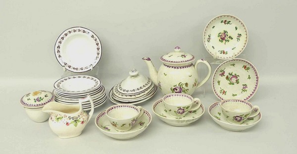 A pearlware child's part tea service, circa 1800, painted with floral sprigs, comprising: tea pot,