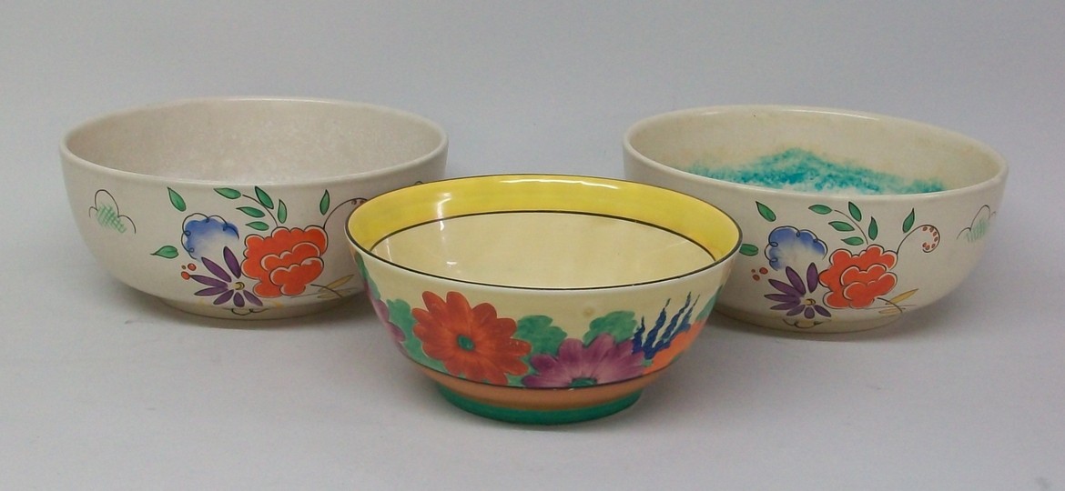 A Clarice Cliff Bizarre, Newport Pottery, bowl decorated in the `Gayday` pattern, 19cm diameter, and