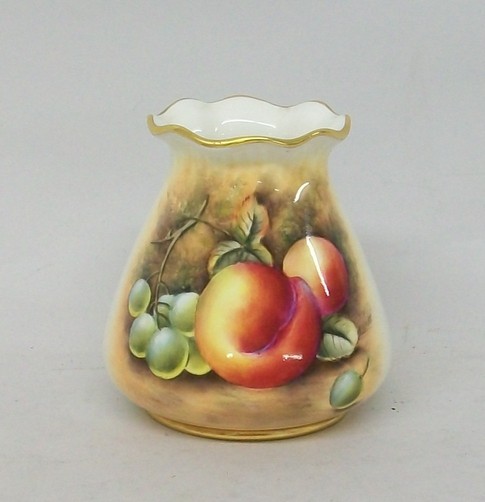 A Royal Worcester porcelain vase, circa 1953, of outswept form with a flared rim, painted by P. M.