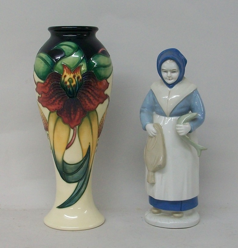 A Moorcroft pottery vase of baluster form decorated in the Anna Lilly pattern, circa 1998, impressed