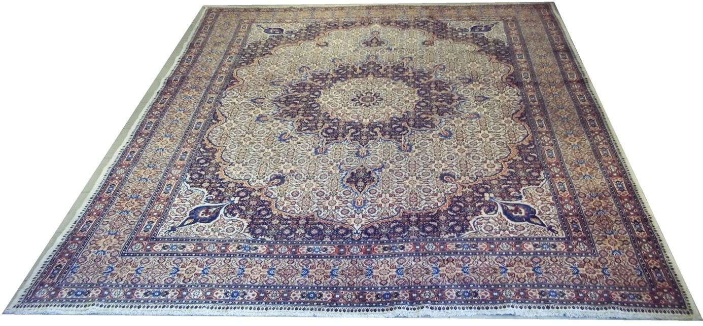 An Iranian Mood hand knotted carpet with dark blue ground and very fine all over pattern, dark