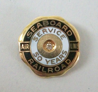 A 14ct gold lapel pin badge from the Seaboard Air Line Railroad, Eastern Seaboard of United