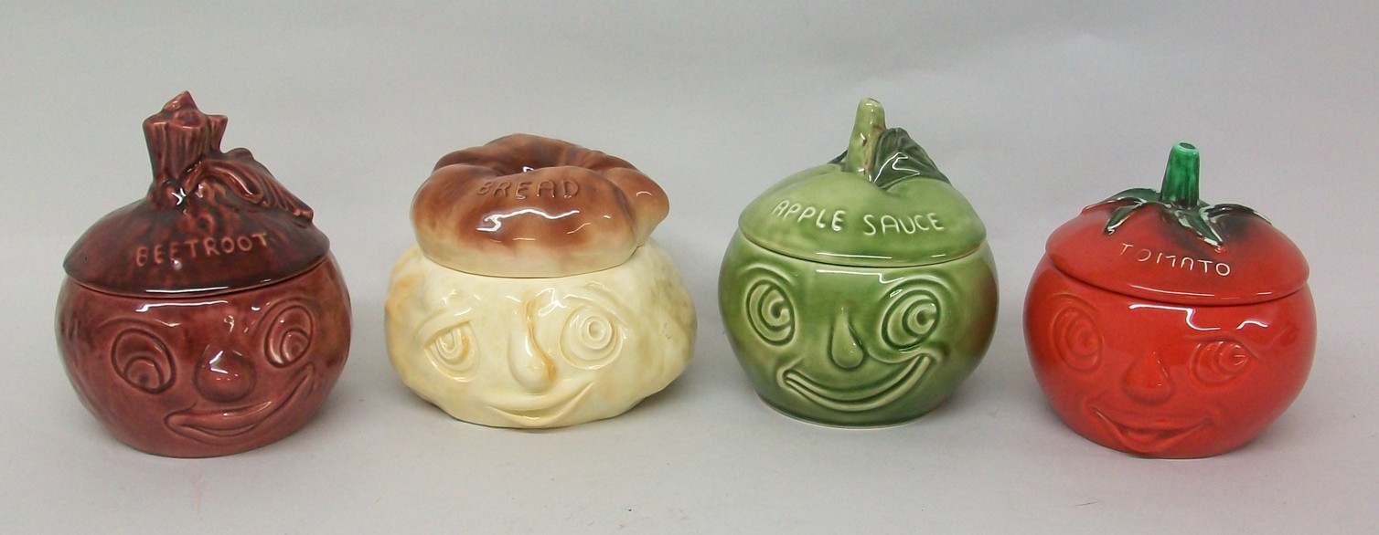 A group of four Sylvac pottery character face pots, comprising; a tomato, 4751, apple sauce, 4549,