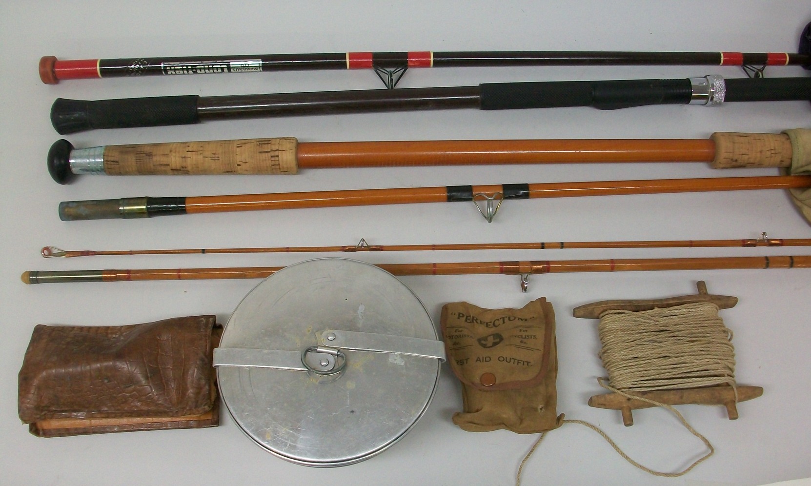 A Milwards Deuflex two piece fishing rod, Carroll McManus cono-flex rod, further rods, Shakespeare