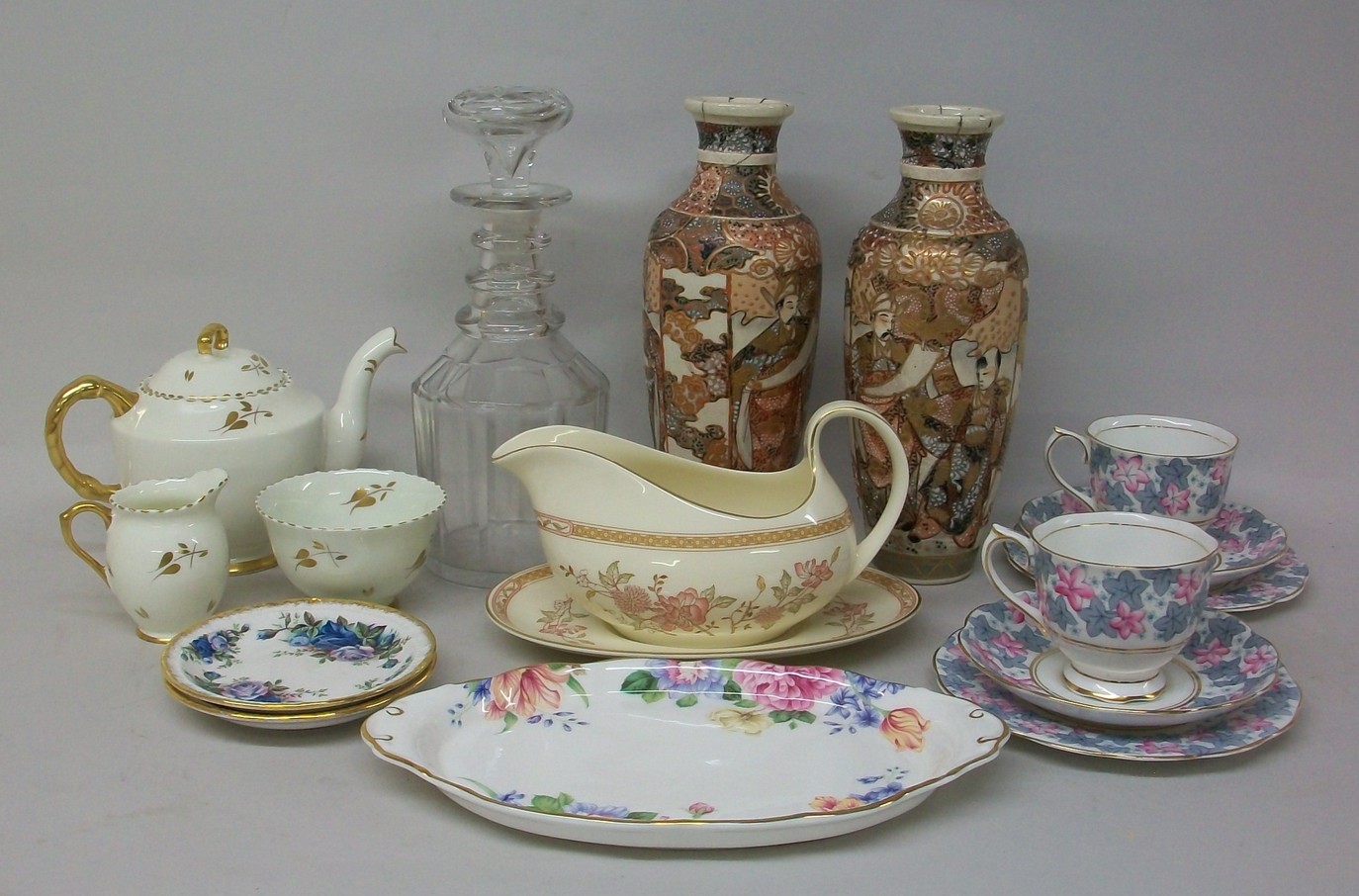 A Victorian cut glass decanter, a pair of Satsuma vases, and sundry ceramics.