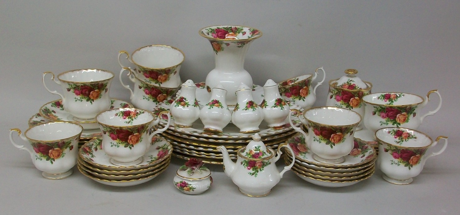 A Royal Albert porcelain part breakfast service decorated in the Old Country Roses pattern, some