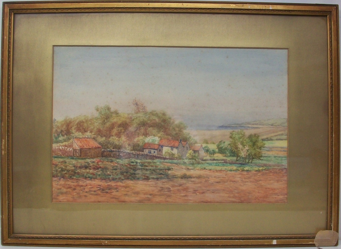 H. C. Sheppard: a watercolour of a farmhouse in countryside setting, signed and dated 1914 lower