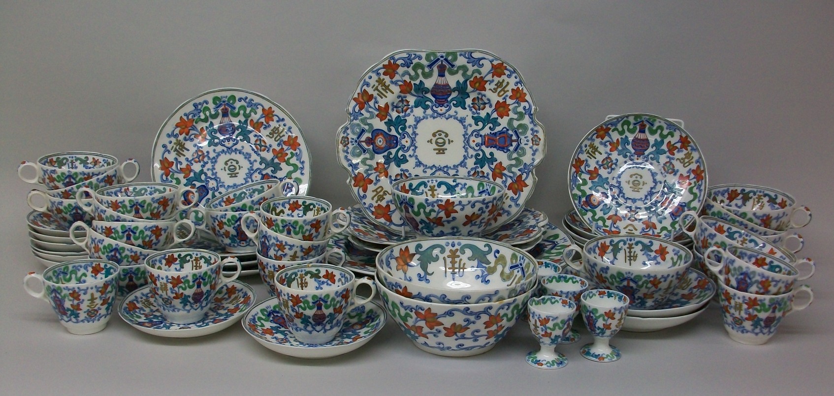 A Mintons porcelain breakfast service, early 19th century, transfer decorated and clobbered in