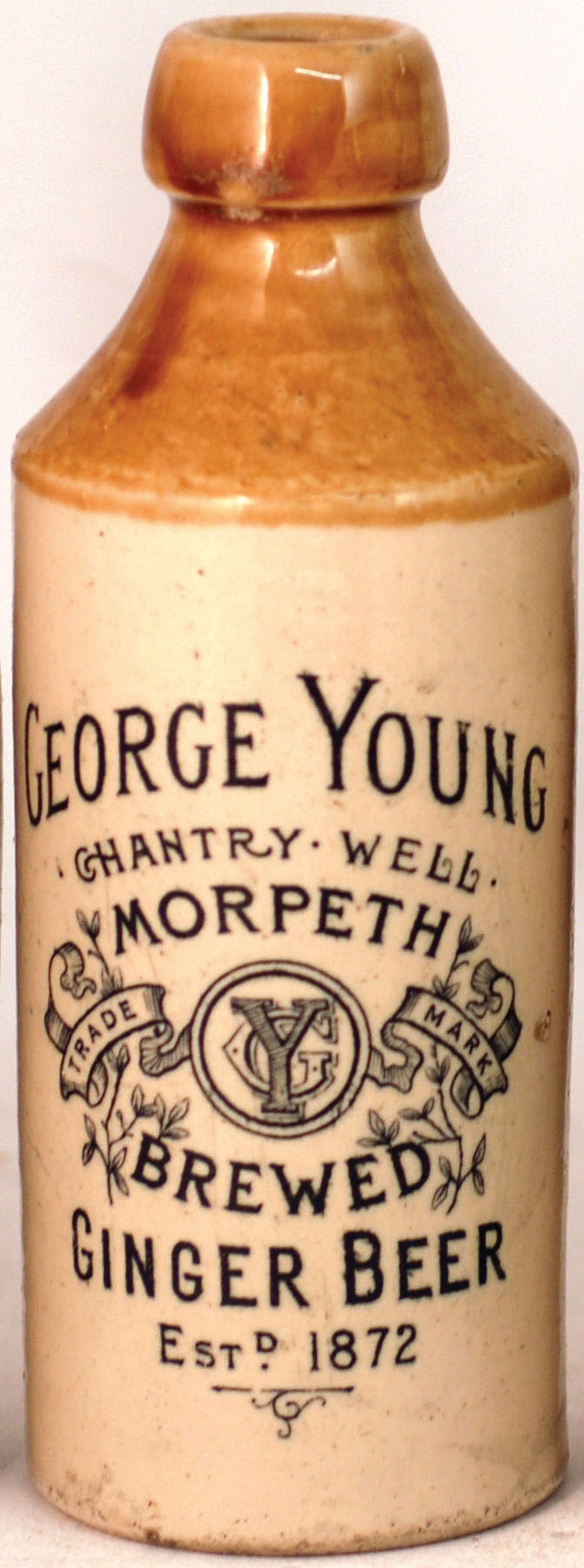 MORPETH GINGER BEER BOTTLE. 7.25ins tall, st. t.t. black transfer ‘GEORGE YOUNG. CHANTRY WELL/