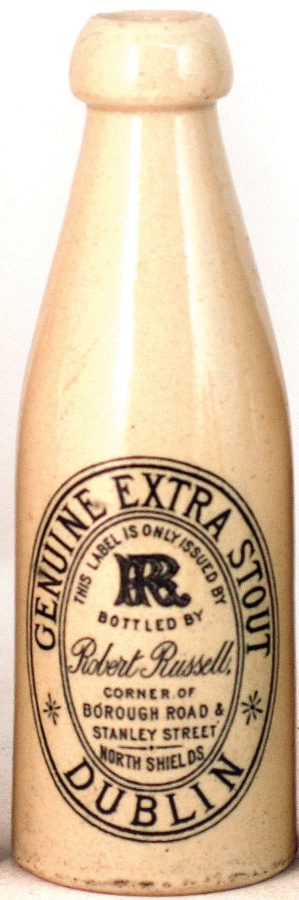 NORTH SHIELDS STOUT BOTTLE. 8ins tall, ch. all white, black transfer ‘GENUINE EXTRA STOUT/ DUBLIN/