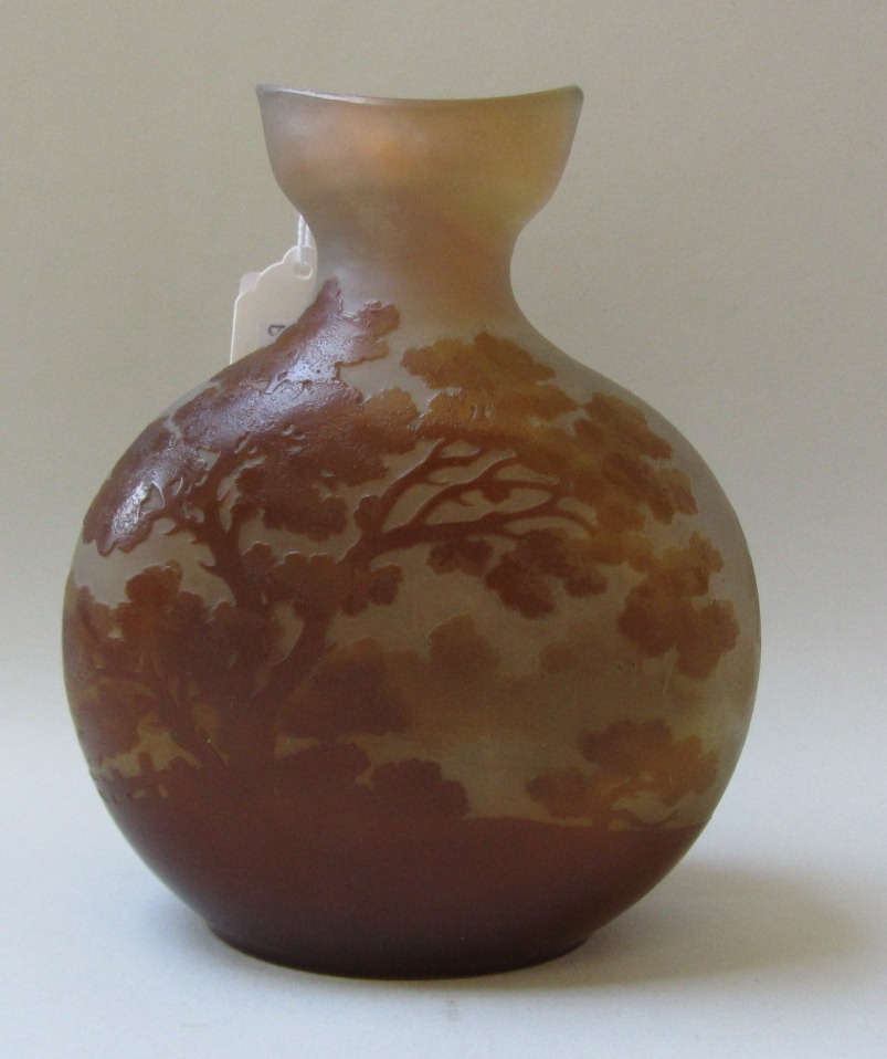 A Galle cameo glass paysage vase, circa 1910, with everted neck, overlaid and acid etched with a