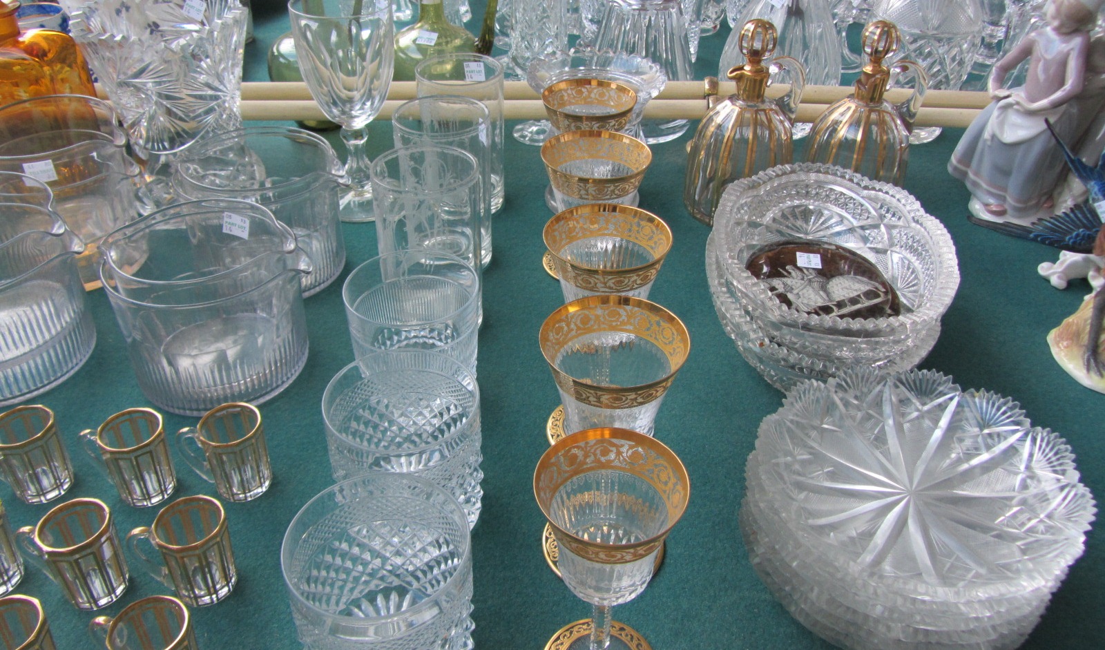 A quantity of glasswares, including; a set of six clear glass rummers, early 19th century, two amber