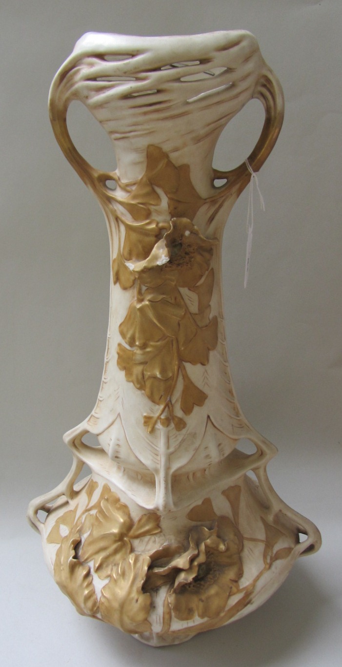 A Royal Dux amphora porcelain vase of Art Nouveau design, decoration with applied gilt flowers