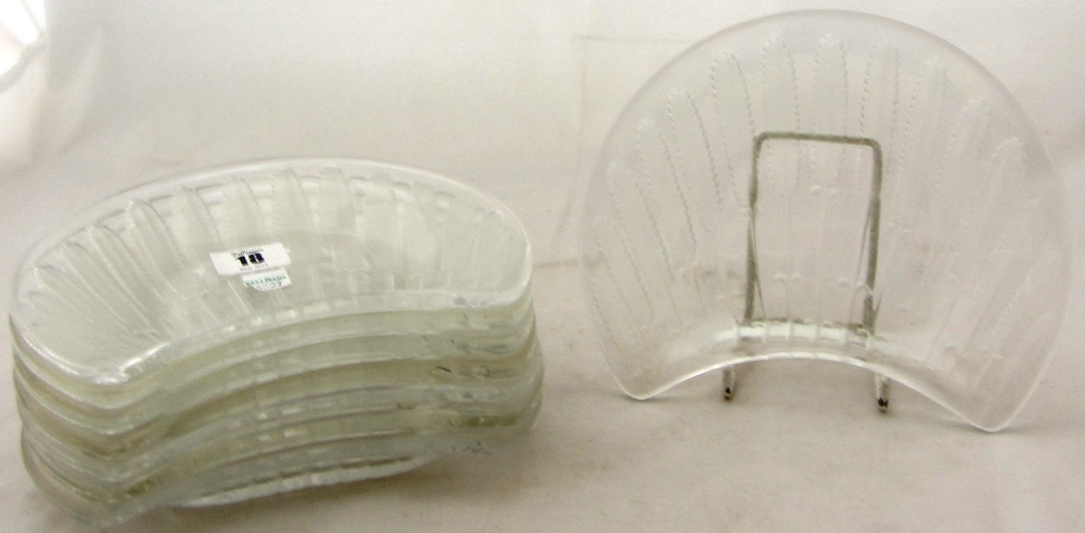 Eight Lalique clear and frosted glass side plates, each decorated with radiating ears of wheat,