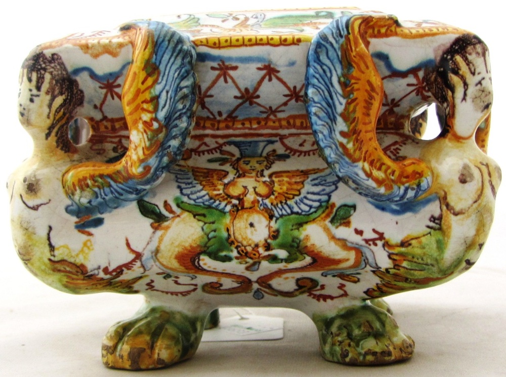 An Urbino style maiolica salt, 20th century.