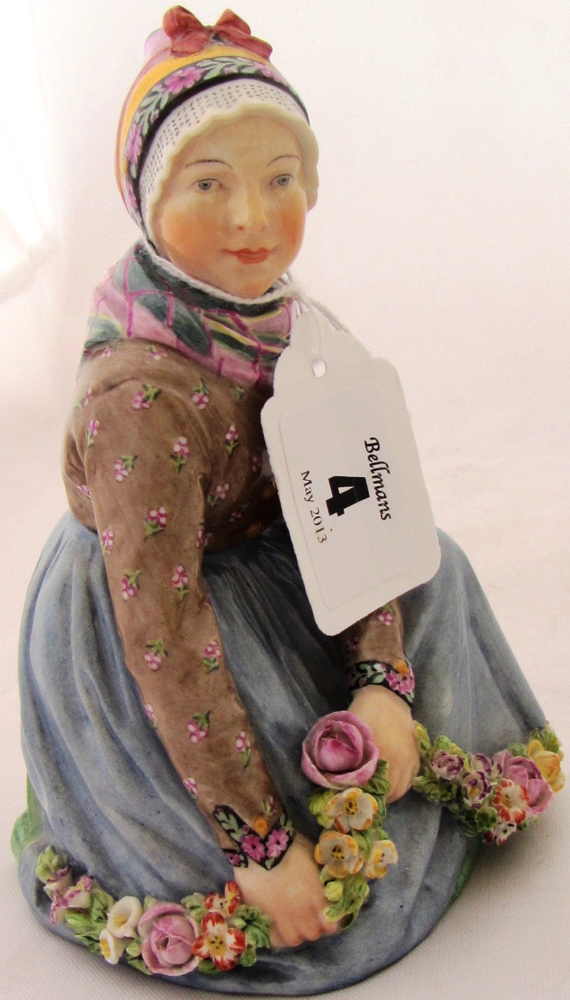 A Royal Copenhagen porcelain figure of a young Dutch girl in regional costume 'Fano' No 12413 by