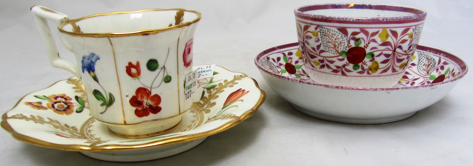 A group of six English flower painted cups and saucers, early 19th century, comprising a bute shaped