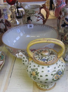 A quantity of ceramics, including; a pair of Staffordshire jugs, two Staffordshire flatback figures,