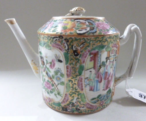 A Canton famille rose teapot and cover, 19th century, of cylindrical form with entwined strap