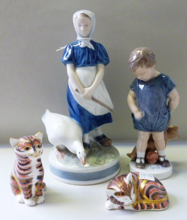 A Royal Copenhagen porcelain figure, No 527 modelled as a Dutch girl and goose, a Royal Copenhagen