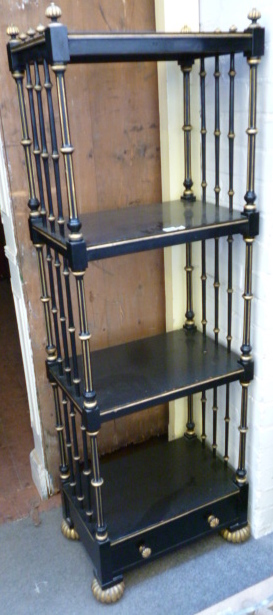 A late Regency parcel gilt and ebonised four tier whatnot, with single drawer base, 51cm wide.