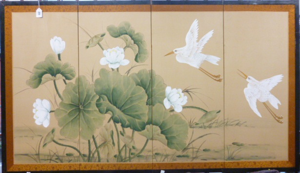 A Japanese four panel table screen, 20th century, painted with heron and lotus, 89cm by 152cm.