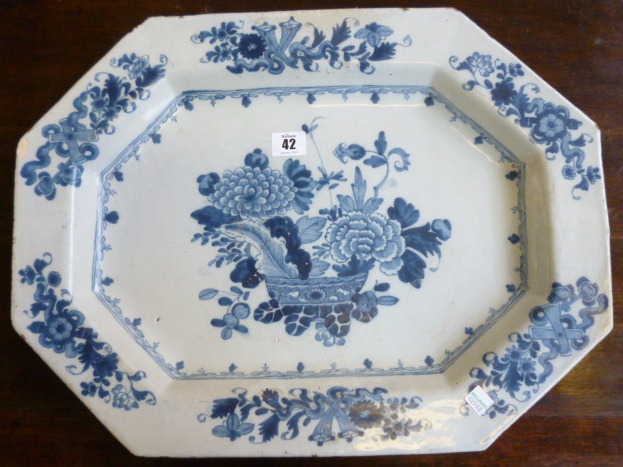 A large Dublin Delftware blue and white octagonal dish, mid 18th century, painted in the centre with