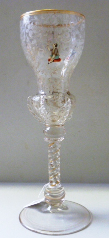 A tall engraved Venetian goblet with enamelled figures, 27.5cm high.