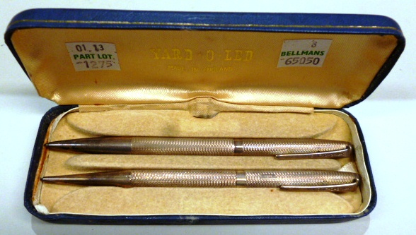 A silver cased Yard-O-Led propelling pencil, with engine turned decoration, Birmingham 1970 and a