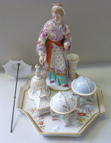 A Berlin figural desk set, late 19th century, blue painted sceptre marks, the stand with sceptre and