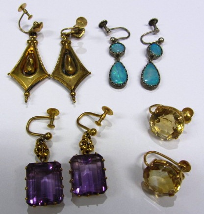 A pair of opal doublet set pendant earrings, a pair of citrine set single stone earrings, each