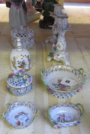 A quantity of 20th century Dresden porcelain, including; a pair of candlesticks, two lidded