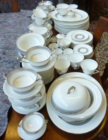 A Royal Doulton porcelain part dinner, tea and coffee service, H4244, Reg No 776716. ]