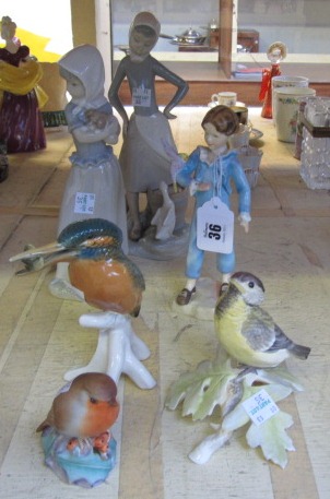 A Lladro porcelain figure, a Nao figure, a Royal Worcester figure, The Parakeet 3087, a Royal