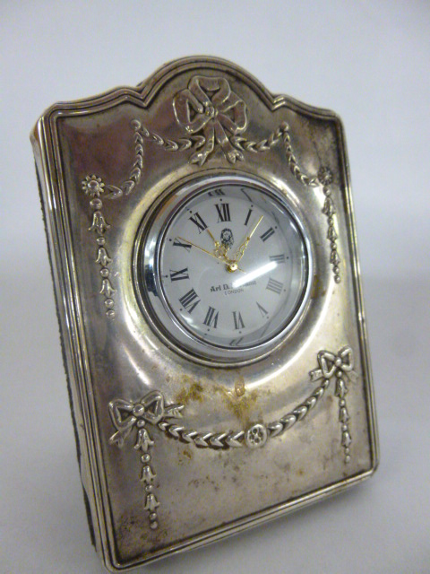 Silver desk clock, hallmarked Sheffield 1995, embossed with swags and ribbons, with Ari D. Norman of